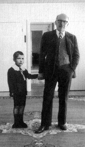 SAUL STEINBERG HOLDING HIS EIGHT-YEAR-OLD SELF BY THE HAND